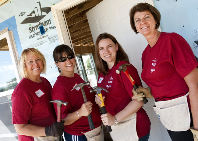 Indiana University Kelley School of Business Career Services Director, Susie Clarke (far right) and her team at a Habitat for Humanity volunteer build day. Photo courtesy of Kelley School of Business