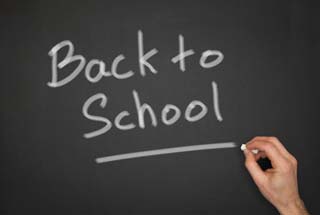 Blackboard with a back to school wrote on it --- Image by © Duncan Andison/Corbis