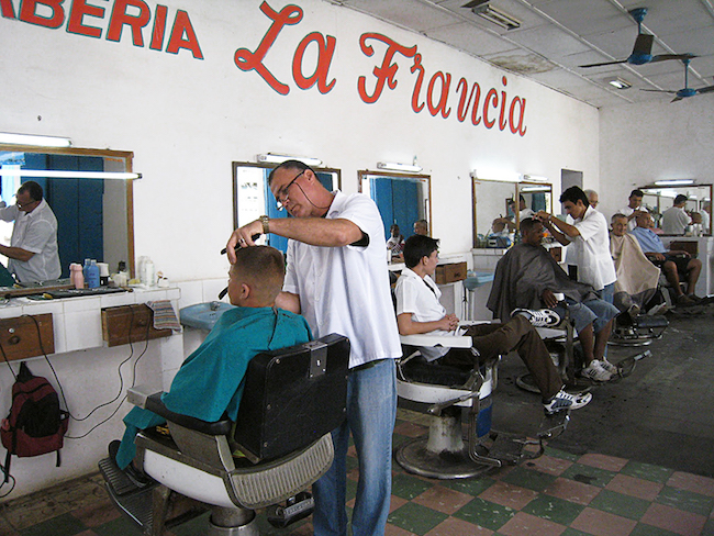 Students in >>> visited a Cuban barbershop and other small businesses in learning about the island's entrepreneurs