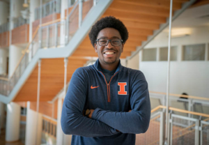 Gies student and person of color, Devin Oliver, wearing University of Illinois jacket.